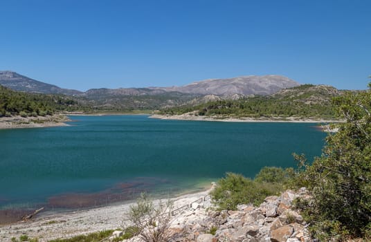 Panoramic view dammed lake Limni Apolakkias at Greek island Rhodes