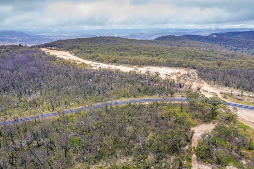 Aerial photograph of a highway and forest regeneration after bushfires near Clarence in the Central Tablelands in regional New South Wales in Australia