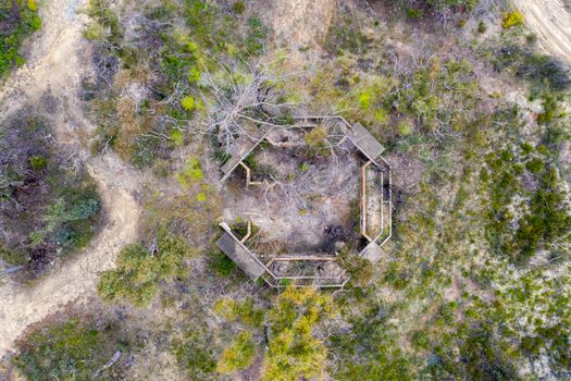 Aerial photograph of structural ruins and forest regeneration after bushfires near Clarence in the Central Tablelands in regional New South Wales in Australia