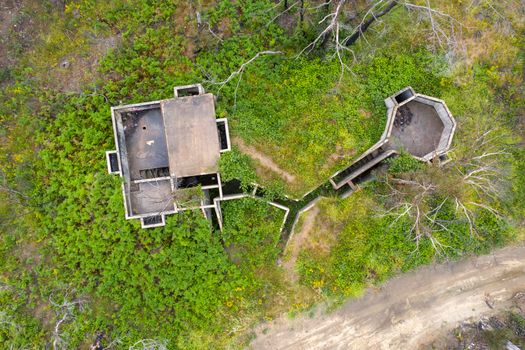 Aerial photograph of structural ruins and forest regeneration after bushfires near Clarence in the Central Tablelands in regional New South Wales in Australia