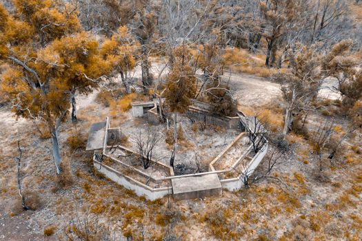 Aerial photograph of structural ruins and forest regeneration after bushfires near Clarence in the Central Tablelands in regional New South Wales in Australia