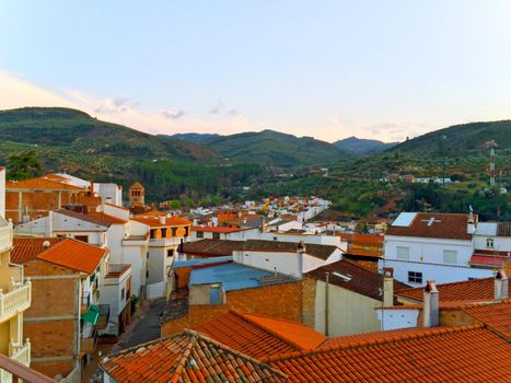 View of village with white houses, valley and mountains, summer, Spain