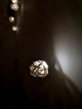 Small decorative luminous ball, night time, macro
