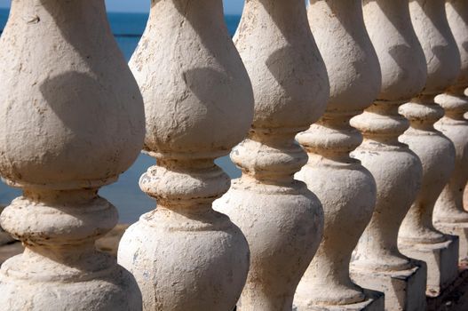 White gallery columns and sea, summer