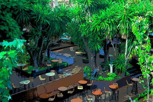 View of outdoor restaurant with green trees, summer