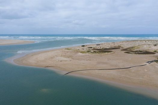 Aerial view of the beach at the mouth of the Murray River in South Australia