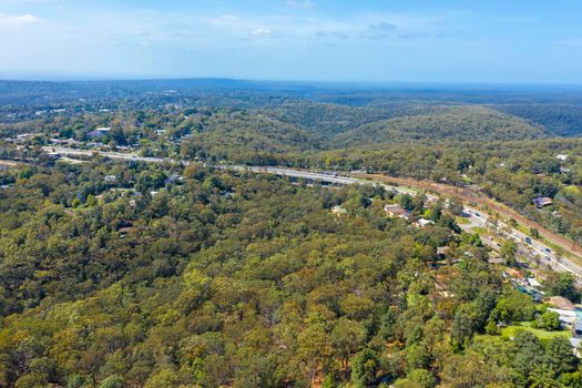 Aerial view of the Great Western Highway running through the township of Warrimoo in The Blue Mountains in regional New South Wales in Australia