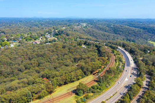Aerial view of the Great Western Highway running through the township of Warrimoo in The Blue Mountains in regional New South Wales in Australia