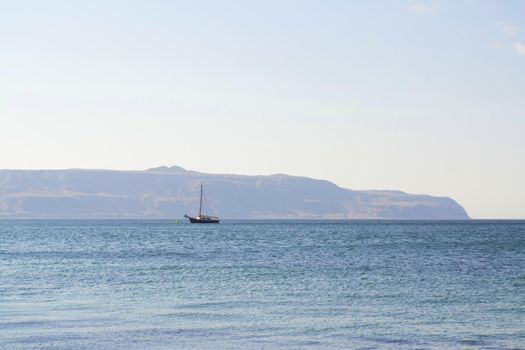 Sailing yacht off the coast of Antofagasta, Chile.