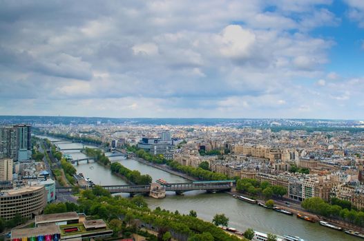 The city of Paris, the Seine river and the Island of the Swans, from the second platform of the Eiffel Tower, heading west.