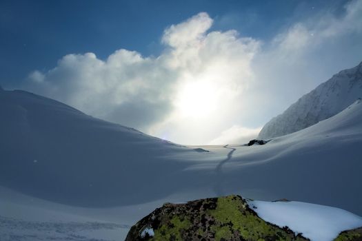 Baikal mountains in winter in snow. Forest in snow-covered mountains.