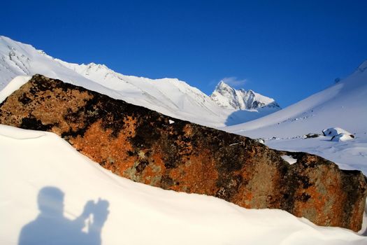 Baikal mountains in winter in snow. Forest in snow-covered mountains.