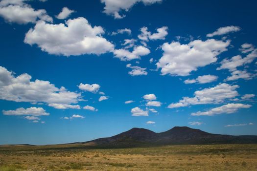 Deep blue sky, over an vast desolate prairie in Argentinian Patagonia.