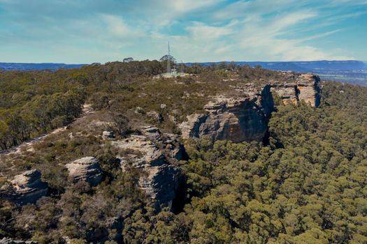 A communications tower on a small mountain in the township of Lithgow in the Central Tablelands of New South Wales in Australia