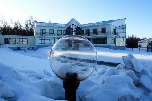 Plafonds of street lights in winter near the hotel on Baikal.