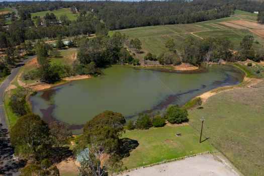 A lake in a state park conservation area which is used for tourism and recreation.