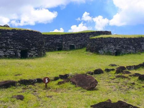 The dwellings of ancient aboriginals on Easter Island. made of shelter stones and walls.