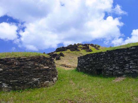 The dwellings of ancient aboriginals on Easter Island. made of shelter stones and walls.