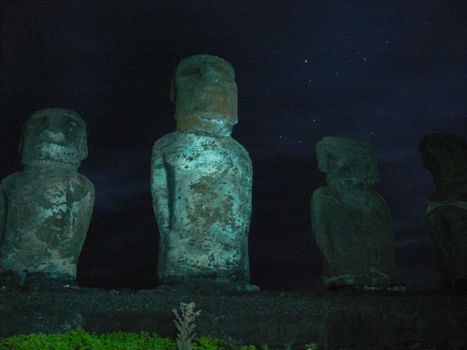 Statues of Easter Island at night. Ancient statues of ancient civilization