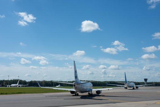 July 2, 2019 Moscow, Russia. Airplanes at Vnukovo airport in sunny weather