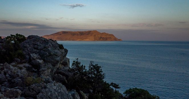 View of the Meganom Peninsula from Cape Alchak in Crimea on a warm summer evening.