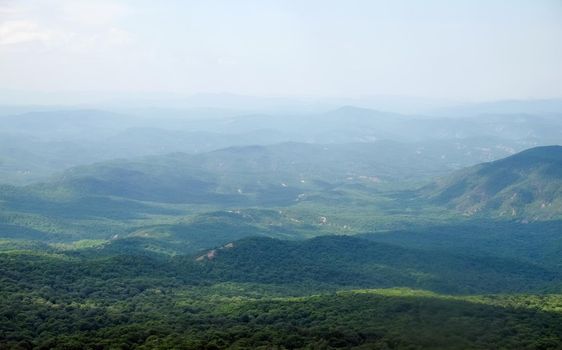 A view of the mountains covered with dense forest from the upper plateau of the Chatyr-Dag mountain range in Crimea.