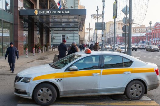 December 2, 2020, Moscow, Russia. Taxi at the InterContinental Hotel on Tverskaya Street in Moscow.