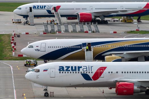 July 2, 2019, Moscow, Russia. Airplanes Boeing 767-300 Azur Air airline and Airbus A330-300 I Fly Airlines at Vnukovo airport in Moscow.