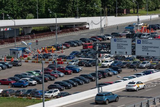 July 2, 2019 Moscow, Russia. Cars in a parking lot near the Vnukovo International Airport in Moscow.