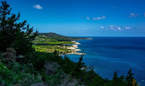 Green mountainous coast of the Mediterranean Sea on the Akamas Peninsula in the northwest of the island of Cyprus.