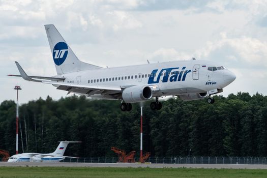 July 2, 2019, Moscow, Russia. Airplane Boeing 737-500 UTair Aviation Airlines at Vnukovo airport in Moscow.