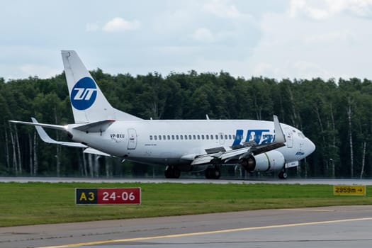 July 2, 2019, Moscow, Russia. Airplane Boeing 737-500 UTair Aviation Airlines at Vnukovo airport in Moscow.