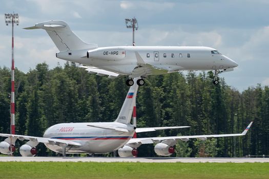 July 2, 2019, Moscow, Russia. Airplane Bombardier BD-100-1A10 Challenger 300 Amira Air airline at Vnukovo airport in Moscow.