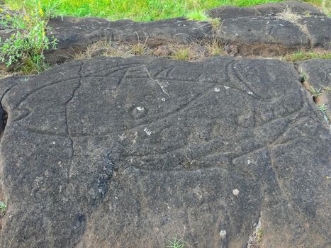 Stone slabs with drawings on Easter Island. Traces of stone processing on plates.