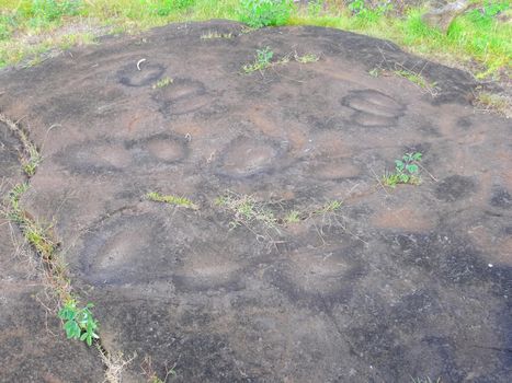 Stone slabs with drawings on Easter Island. Traces of stone processing on plates.