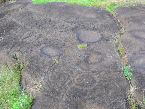 Stone slabs with drawings on Easter Island. Traces of stone processing on plates.