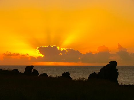 Sunset on Easter Island. The colors of sunset in the ocean.