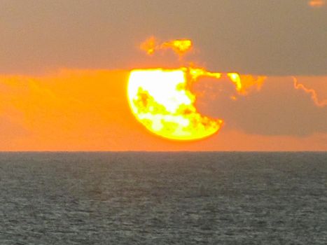 Sunset on Easter Island. The colors of sunset in the ocean.