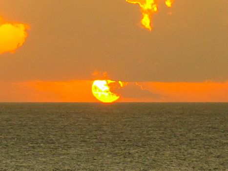 Sunset on Easter Island. The colors of sunset in the ocean.