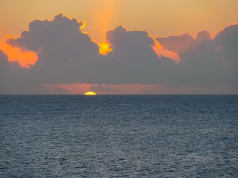 Sunset on Easter Island. The colors of sunset in the ocean.