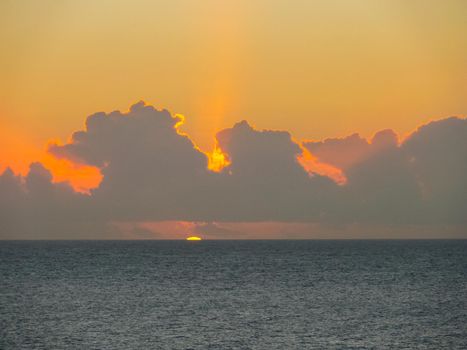 Sunset on Easter Island. The colors of sunset in the ocean.