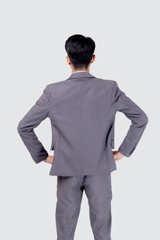 Rear view of young asian businessman in suit with confident isolated on white background, back of portrait business man is manager or executive or employee thinking with success.