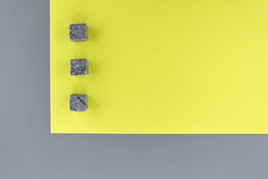 Conceptual image of main color trend of the year 2021 with two tone grey and yellow background viewed as a flat lay with space for text