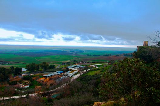 Green lanscape view, big fields and small village, Spain