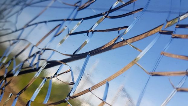 Closeup shot of the cracks on the glass of a window