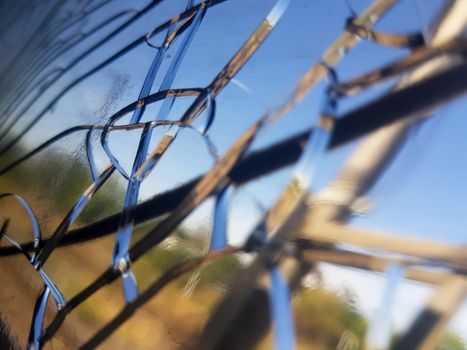 Closeup shot of the cracks on the glass of a window