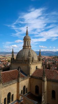 Segovia, Spain – View of the dome of the Cathedral and of Segovia old town from the top of the bell tower. Vertical shot of dome