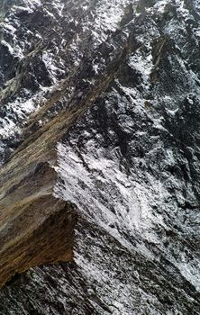 Mount Sayan in winter in the snow. The nature of the mountains is sayan.