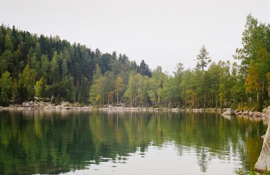 The river is among the mountains and forests of the Altai. Nature of the Altai