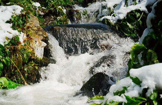 Waterfall on a mountain river in the Altai. The rivers are altai.